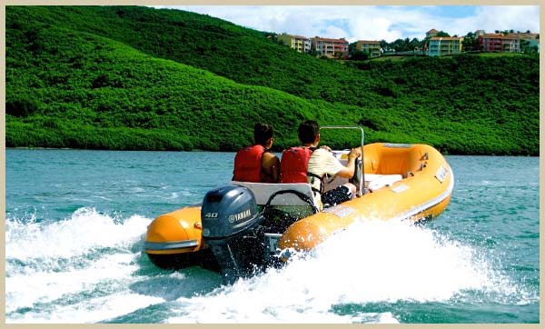 Mini Boat tour passing by El Conquistador Resort